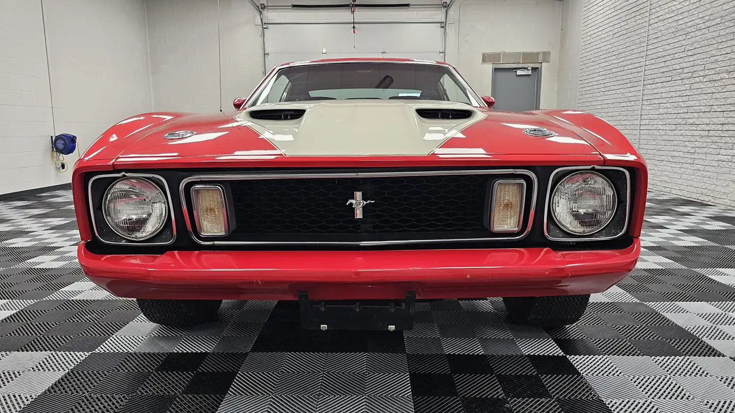 Crimson Fury: A 1973 Ford Mustang Mach 1’s Cobra Jet Roar