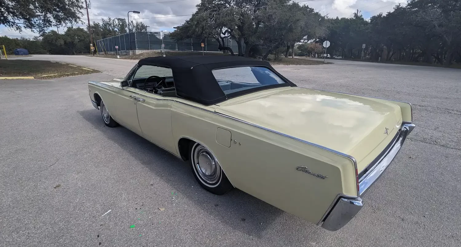 Golden Glide: A 1966 Lincoln Continental Convertible in Radiant Yellow