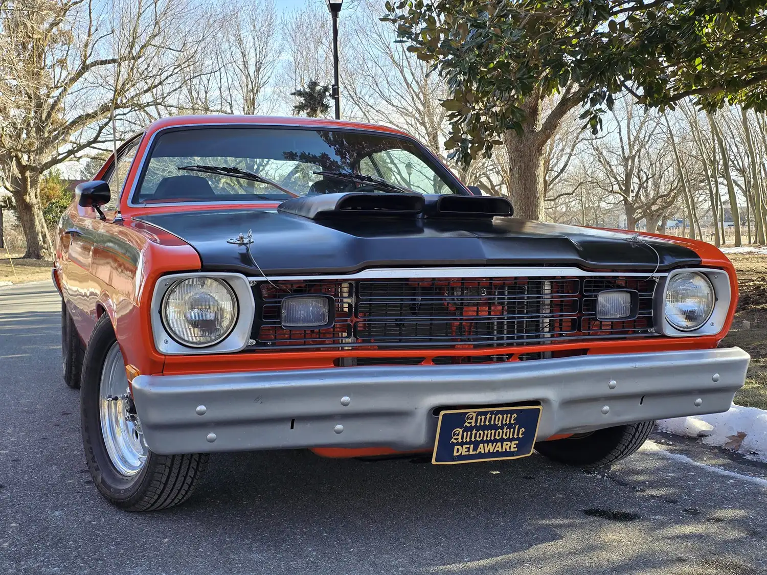 Orange Fury: A 1974 Plymouth Duster Unleashed