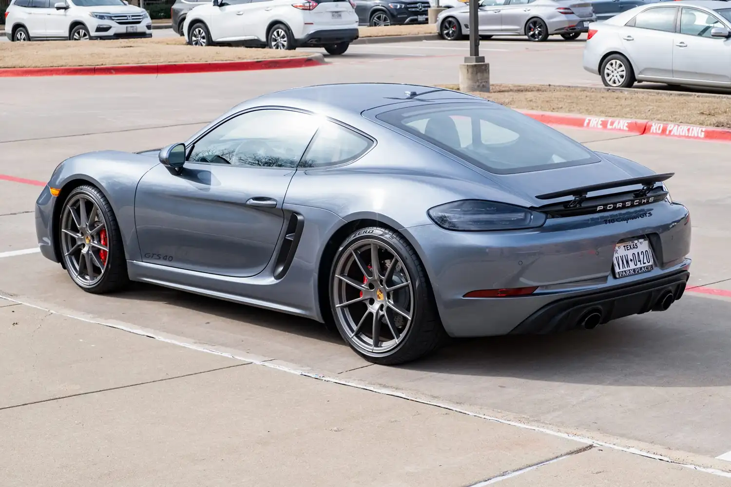 Gray Ghost: A 2025 Porsche 718 Cayman GTS 4.0 with Barely Broken-In Spirit