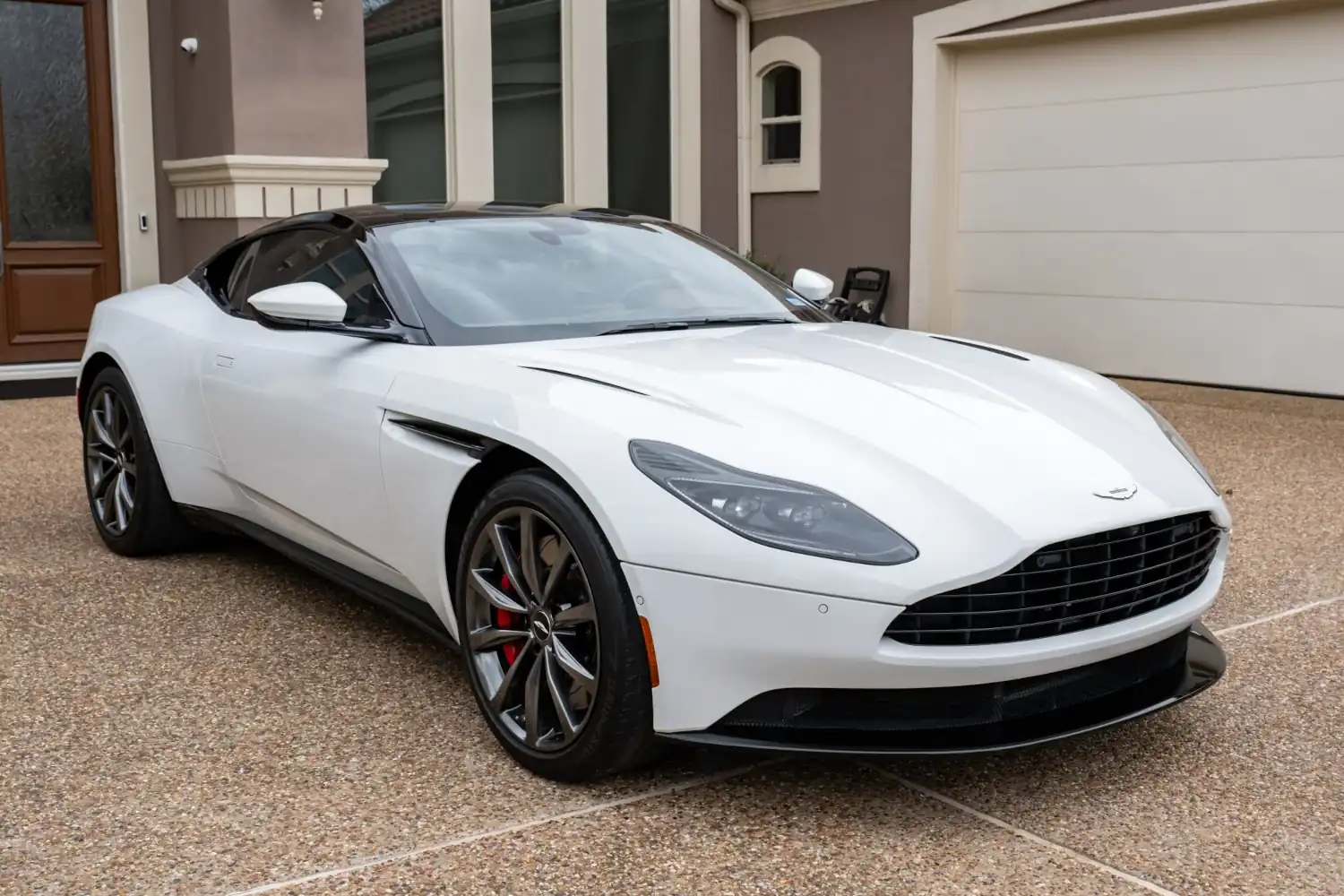 Lunar Luminary: The 2021 Aston Martin DB11 V8 Coupe, A White Canvas of Grand Touring Excellence