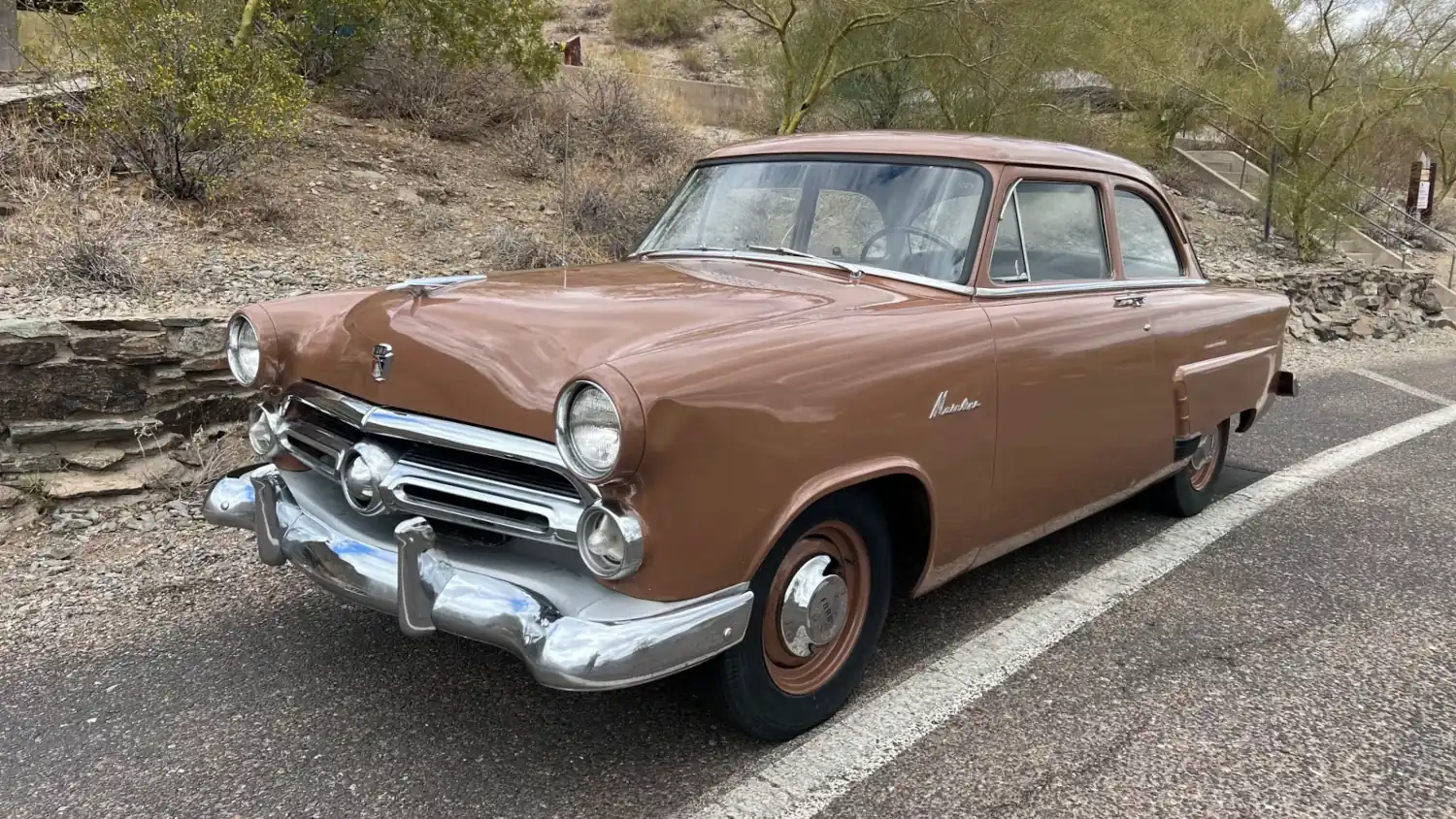 Timeless Traveler: The 1952 Ford Mainline, A Brown Beacon of Classic American Simplicity