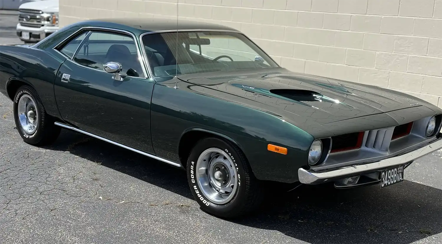 1974 Plymouth ‘Cuda 440 V8 4-Speed: A Muscle Icon in Green Metallic