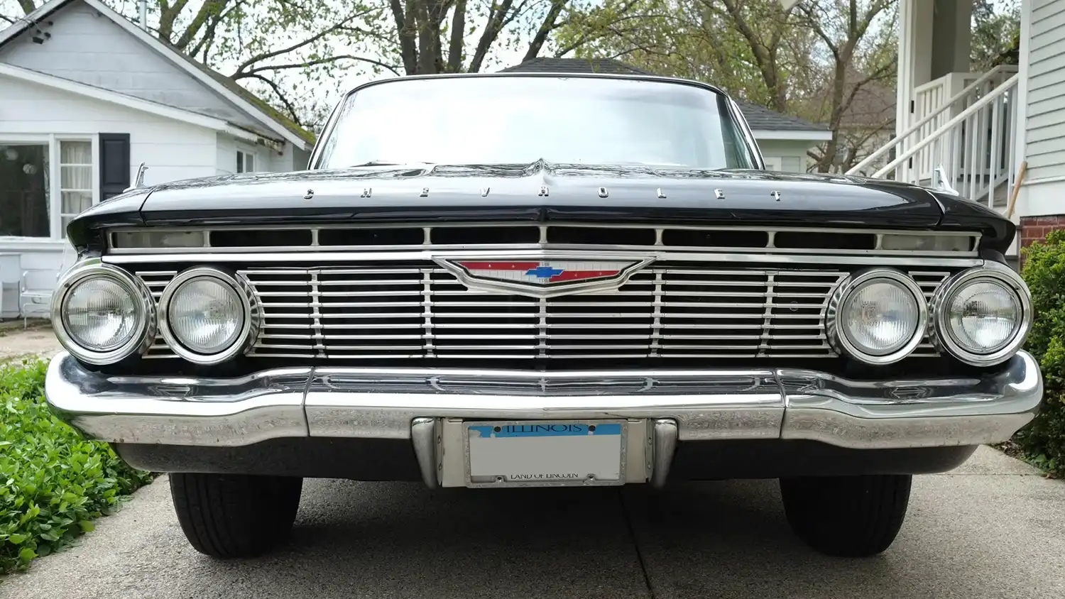 Sleek ’61 Chevy Bel Air Sedan: Powerful 327 V8 in Classic Black