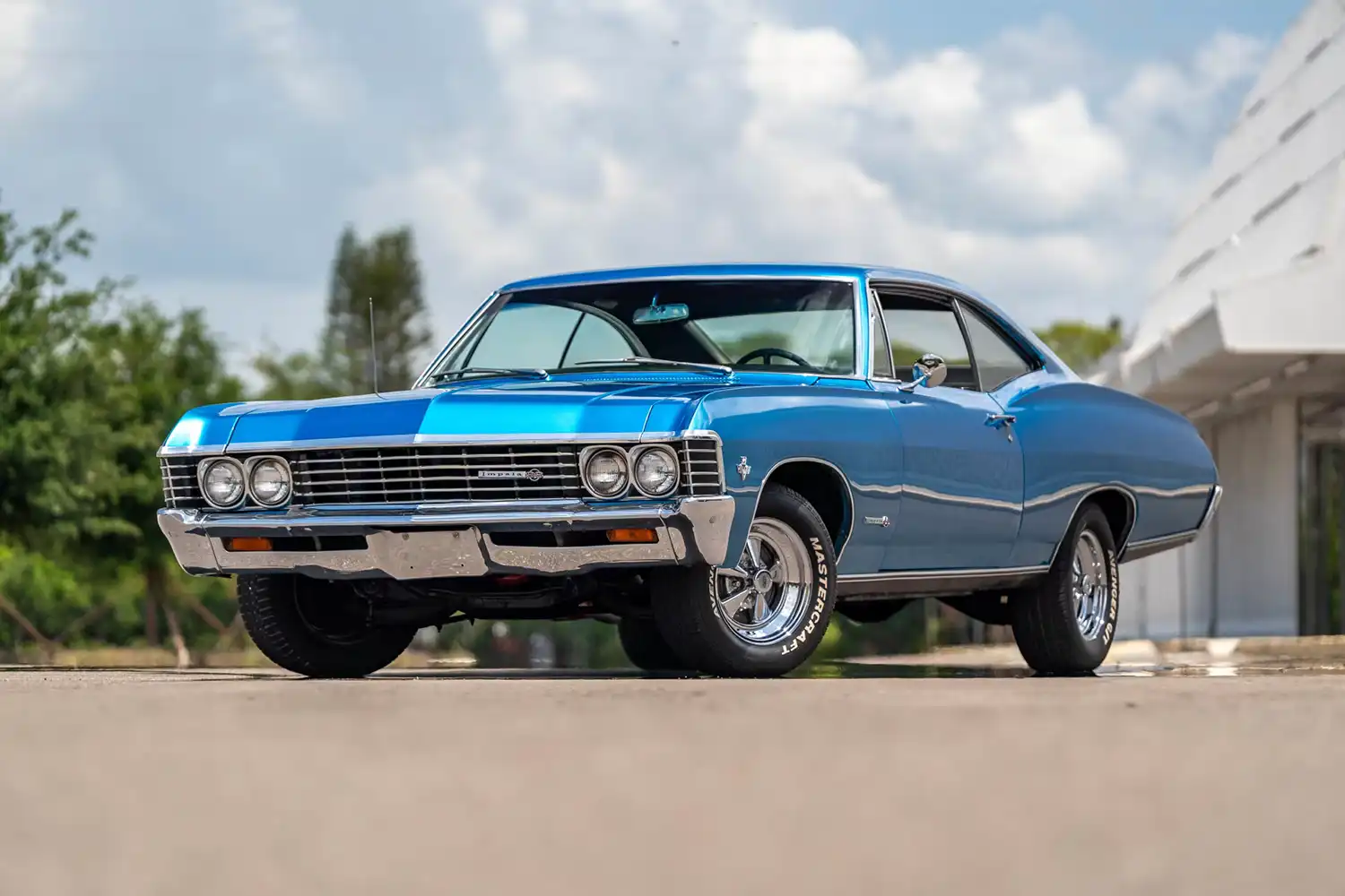 Iconic Cruiser: The Medium Blue 1967 Chevrolet Impala SS