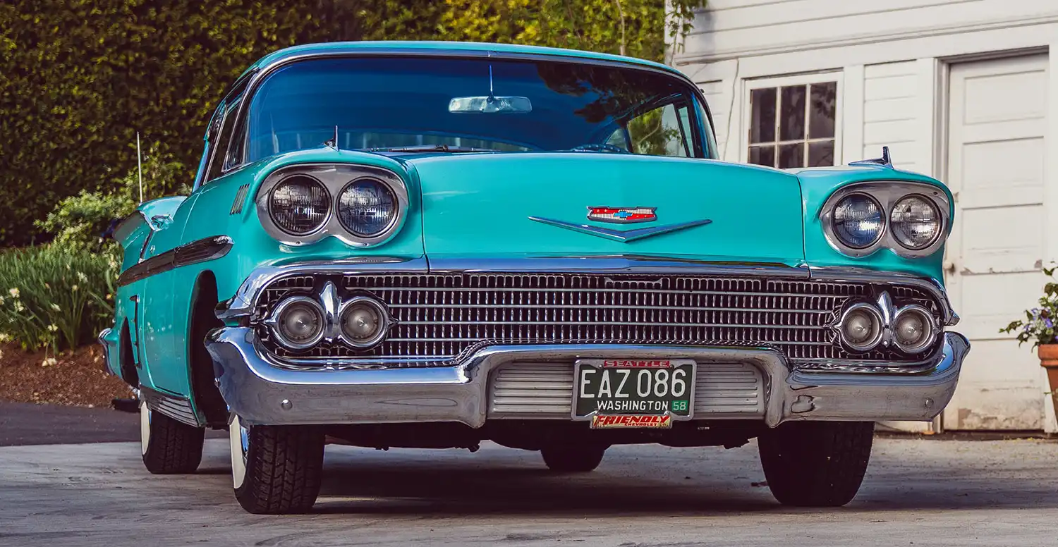 She’s All Chrome and Curves: 1958 Chevrolet Impala Sport Coupe Seduction