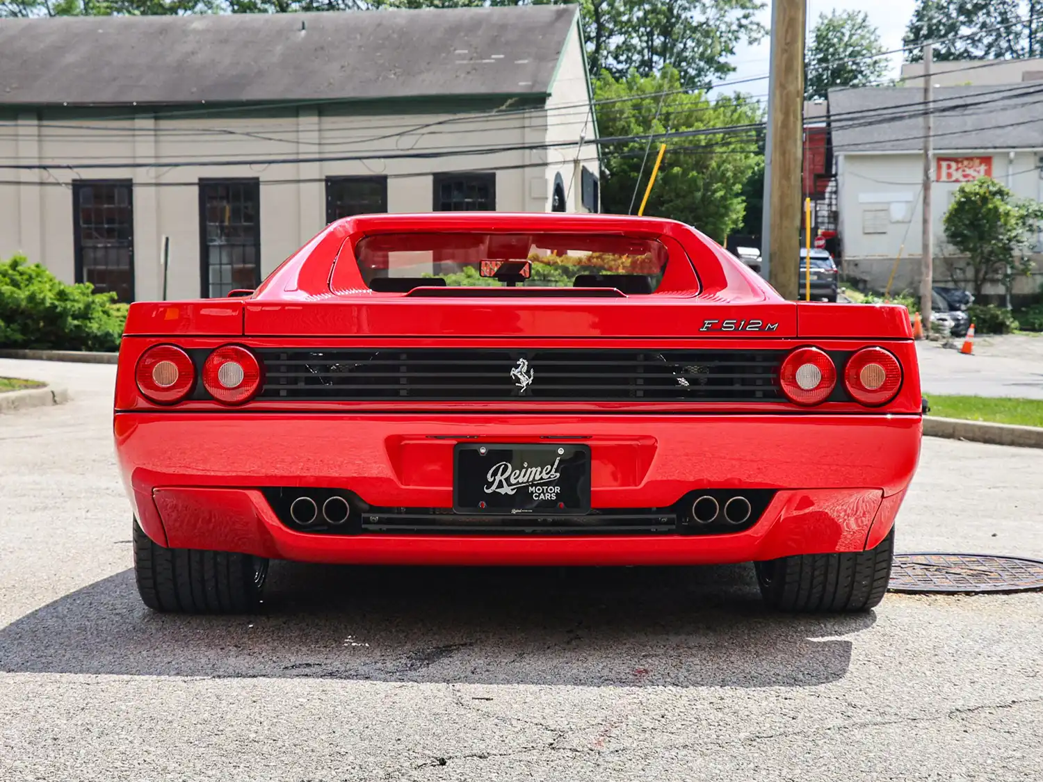 Command the Road: This Exquisite 1995 Ferrari F512 M