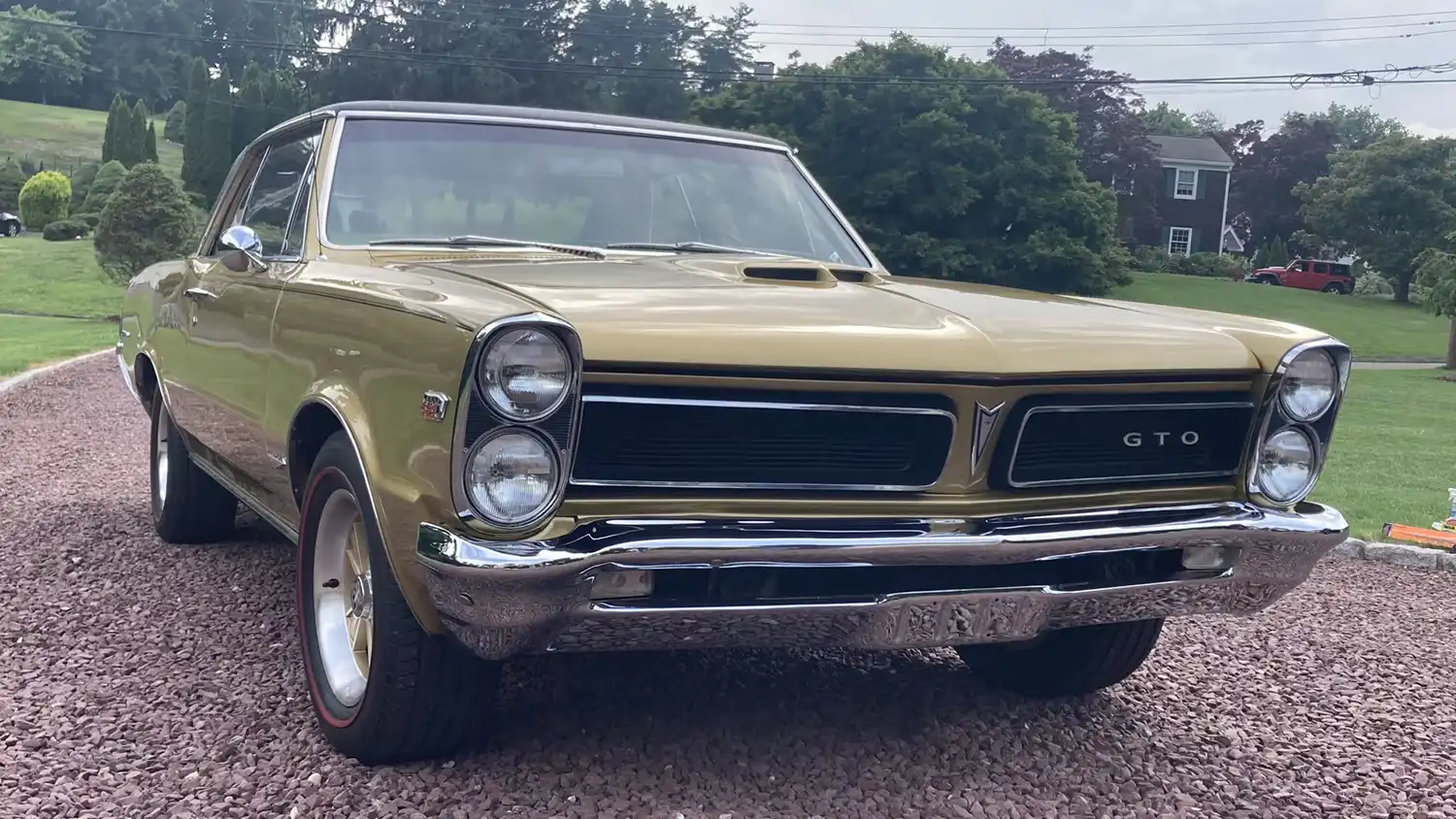 Factory Tiger Gold 1965 Pontiac GTO Returns with Tri-Power Might